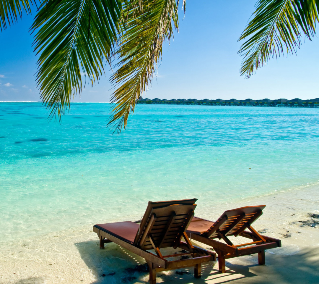 Fondo de pantalla Deck Chairs On Beach 1080x960