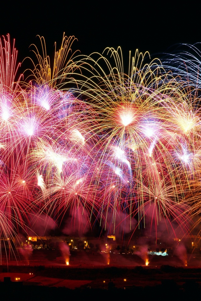 Обои New Years Fireworks 640x960