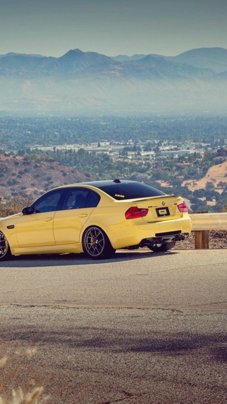 Yellow Bmw M3 E90 Mountain Road screenshot #1 750x1334