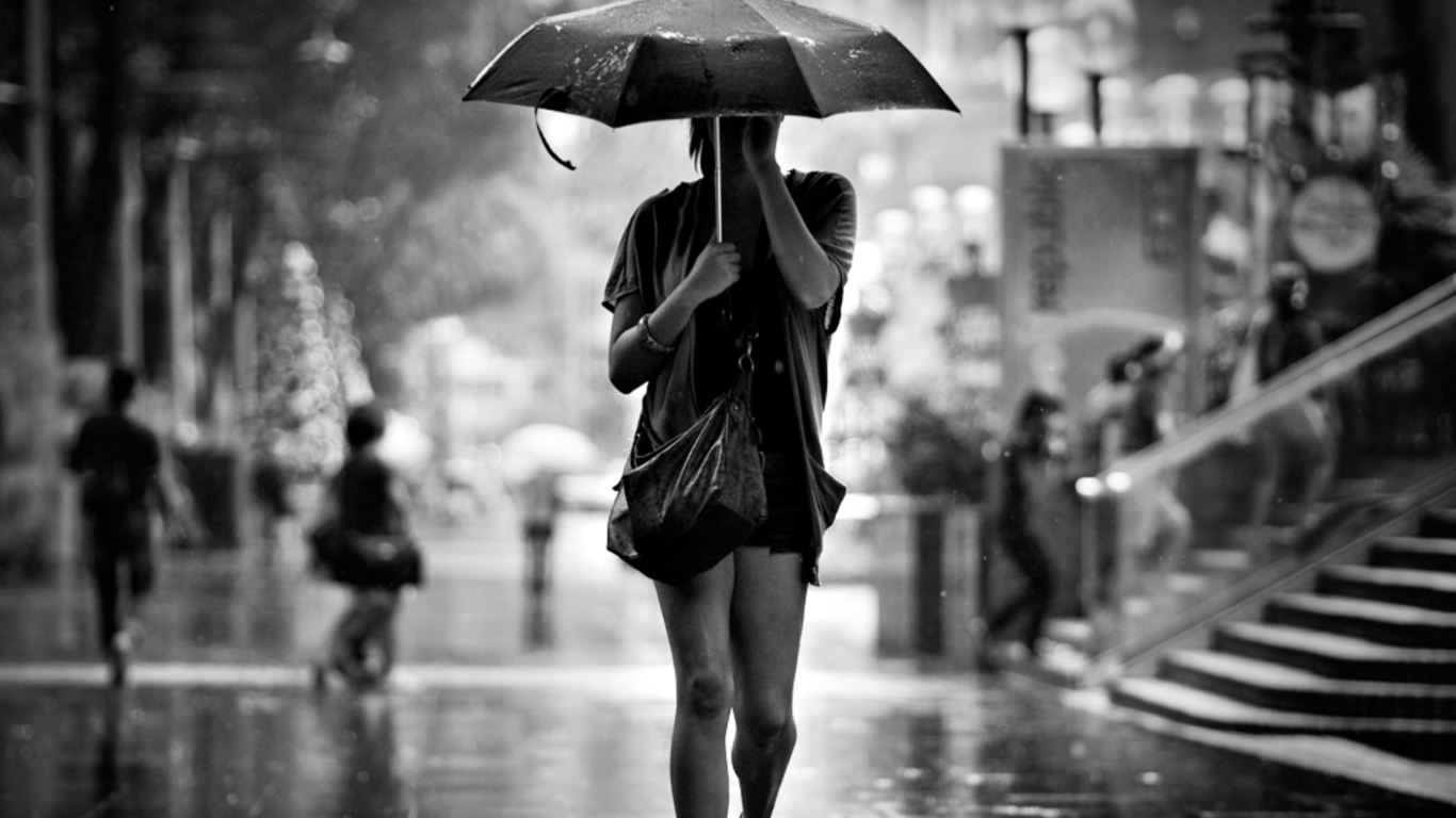 Sfondi Girl Under Umbrella In Rain 1366x768