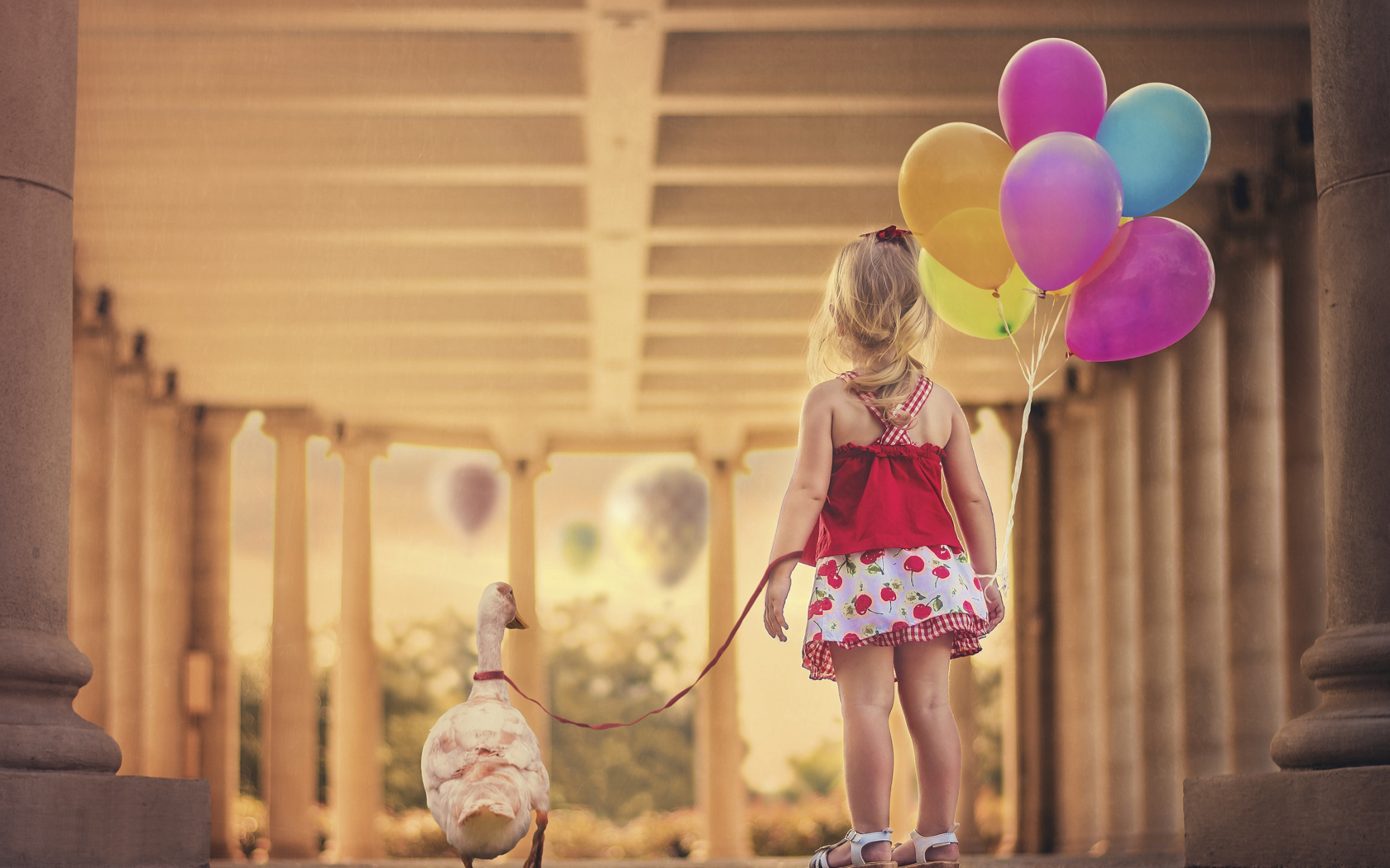 Обои Little Girl With Colorful Balloons 1680x1050