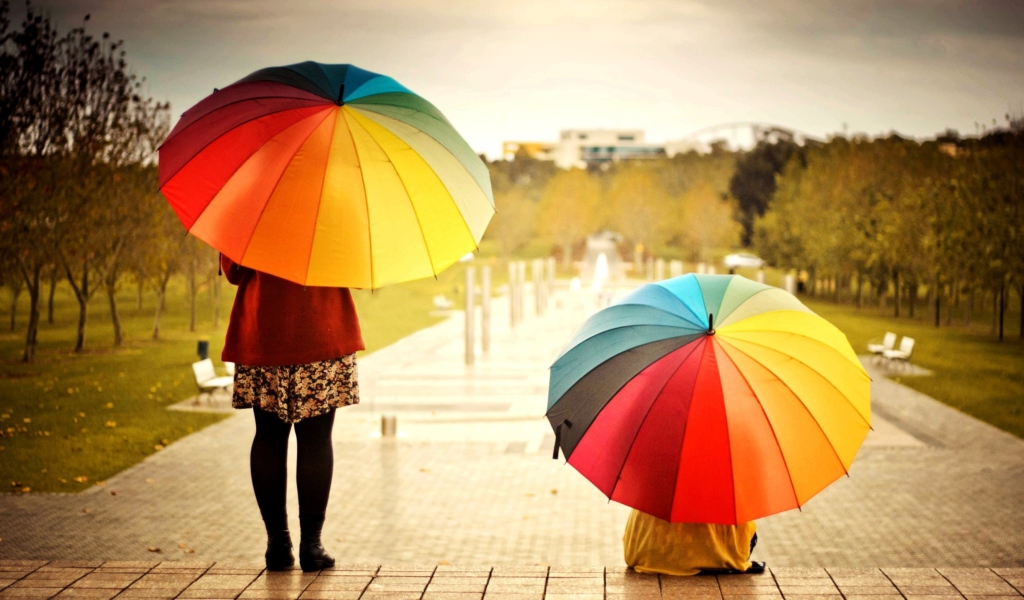 Sfondi Girl With Rainbow Umbrella 1024x600