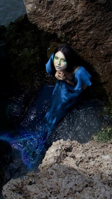 Blue Mermaid Hiding Behind Rocks wallpaper 360x640