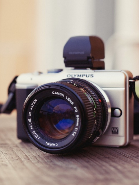 Обои Olympus DSLR Camera 480x640