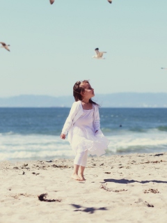 Little Girl At Beach And Seagulls wallpaper 240x320