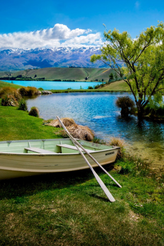Boat on Mountain River wallpaper 320x480