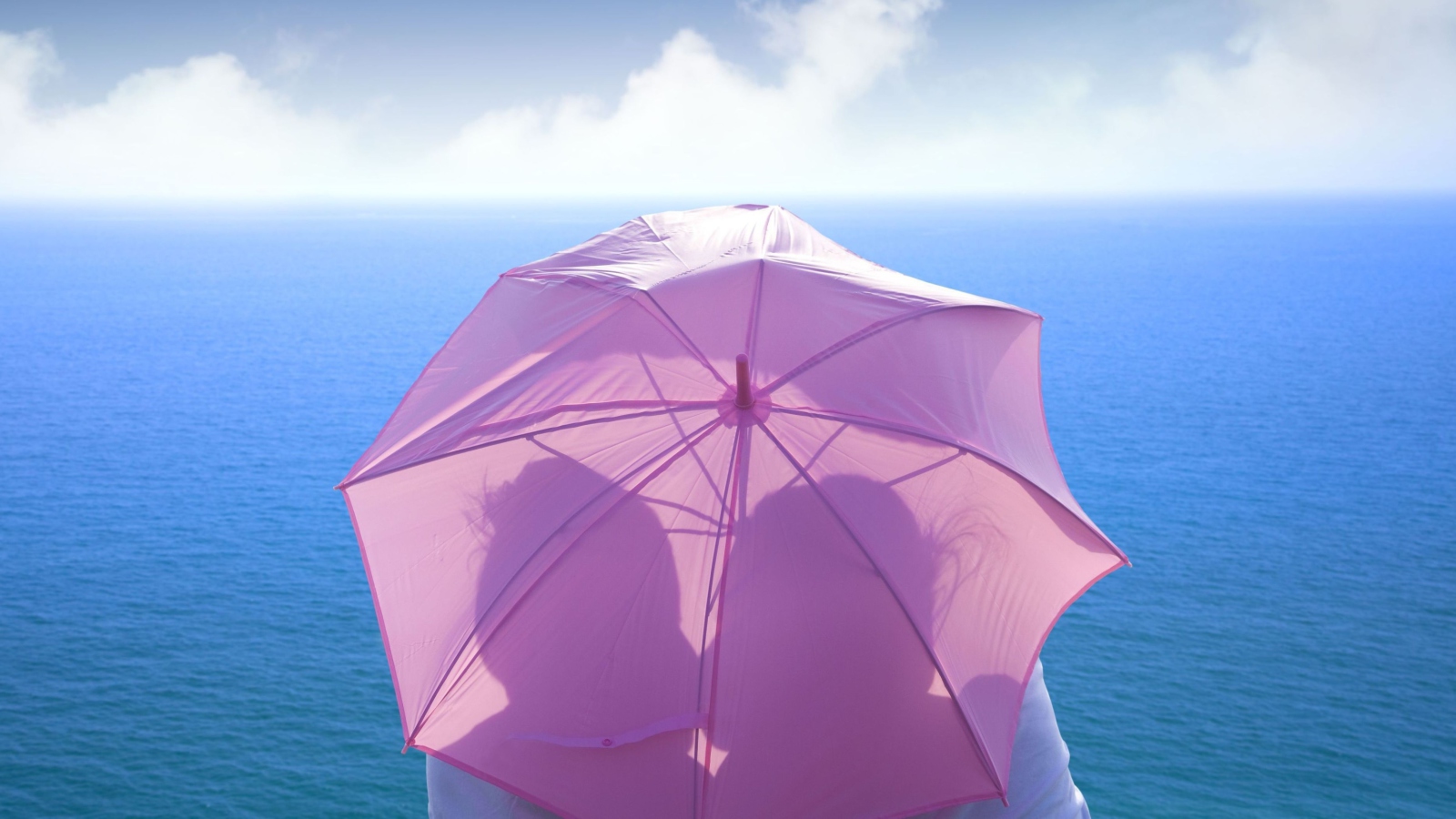 Romance Behind Pink Umbrella wallpaper 1600x900