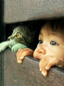 Fondo de pantalla Baby Boy And His Friend Little Kitten 132x176