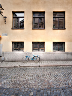 Fondo de pantalla Bicycle On The Street 240x320