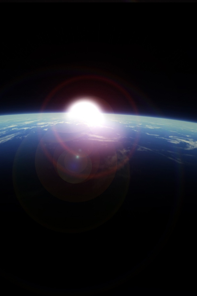 Обои Sunrise From Space 640x960