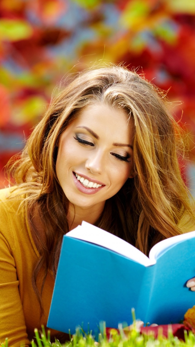 Girl Reading Book in Autumn Park wallpaper 640x1136