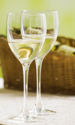 Fondo de pantalla Two Glaeese Of White Wine On Table 240x400