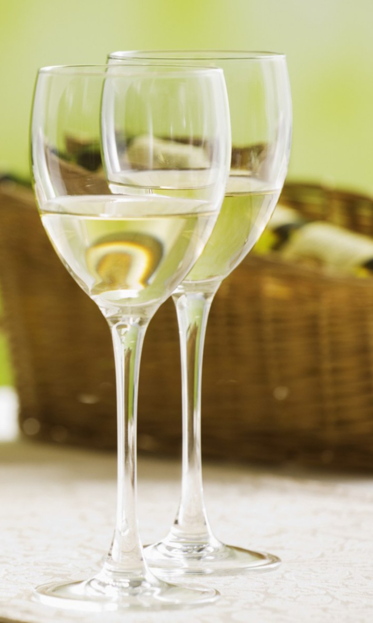 Das Two Glaeese Of White Wine On Table Wallpaper 768x1280