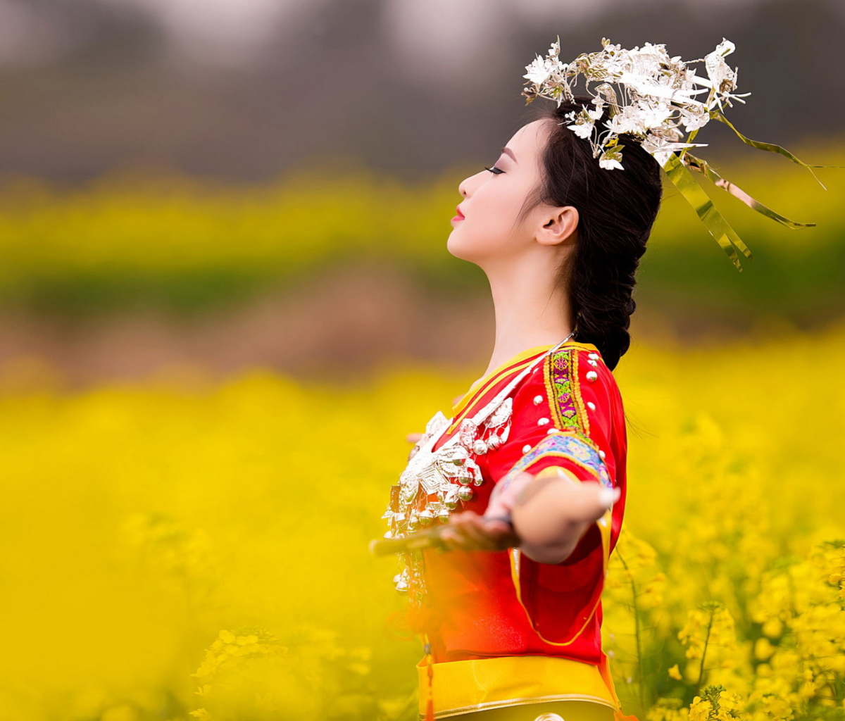 Asian Girl In Yellow Flower Field wallpaper 1200x1024