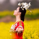 Sfondi Asian Girl In Yellow Flower Field 128x128