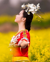 Asian Girl In Yellow Flower Field wallpaper 176x220