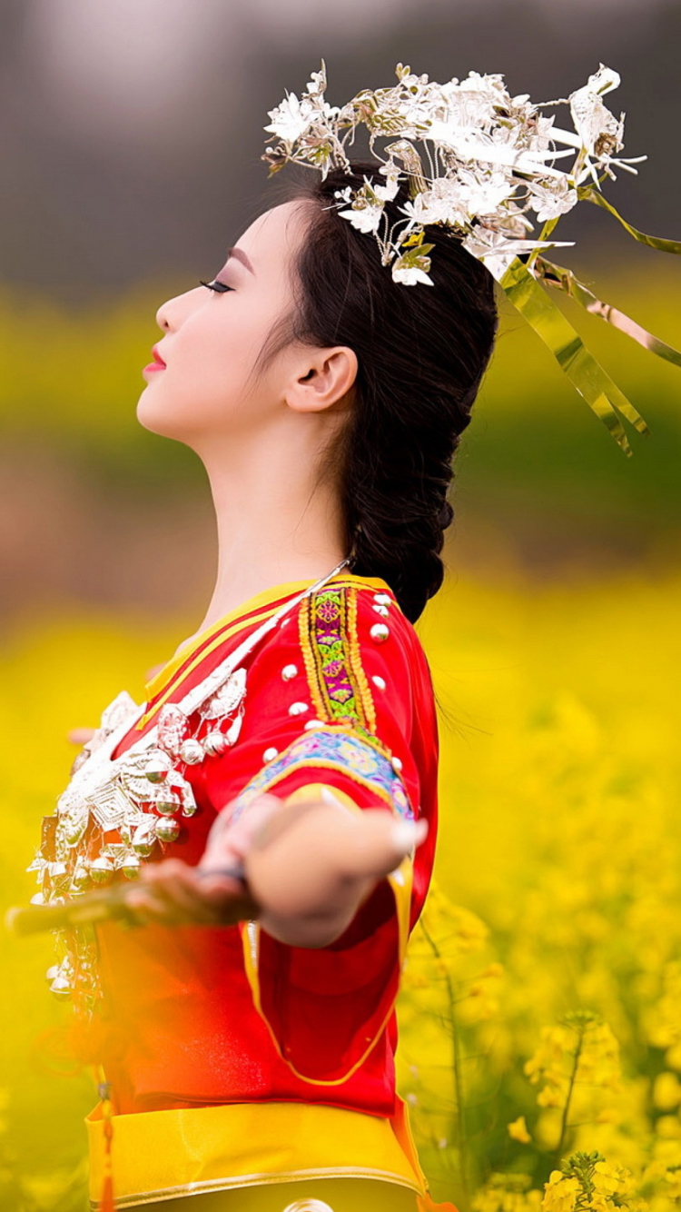 Asian Girl In Yellow Flower Field wallpaper 750x1334
