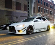 Das Street racing with Mitsubishi Lancer Evo X Wallpaper 176x144