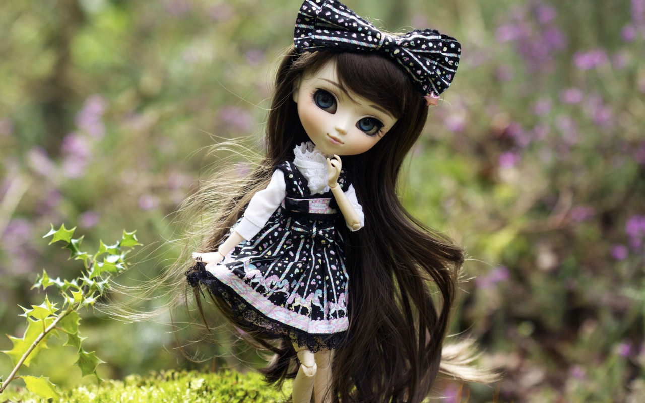 Cute Doll With Dark Hair And Black Bow wallpaper 1280x800