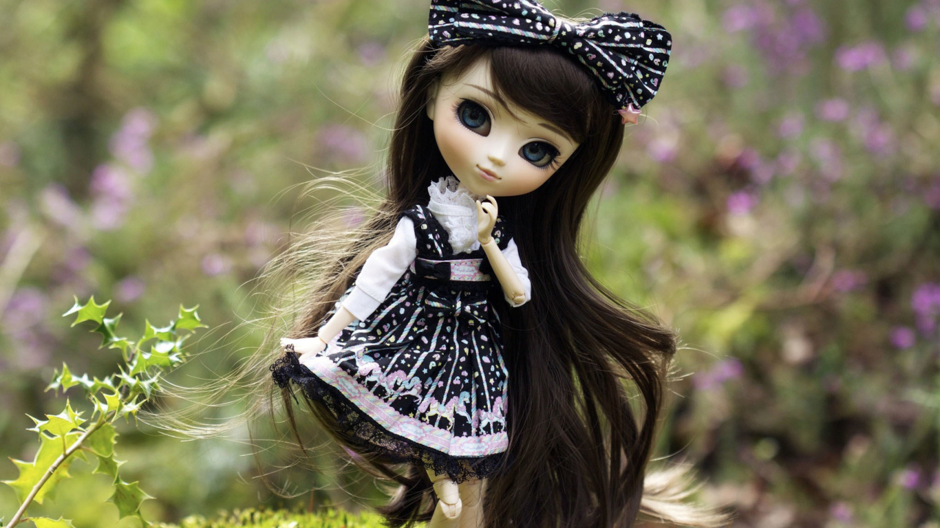 Cute Doll With Dark Hair And Black Bow wallpaper 1366x768