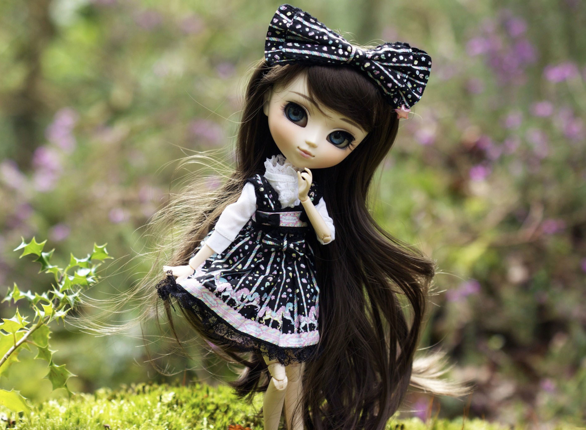 Cute Doll With Dark Hair And Black Bow wallpaper 1920x1408