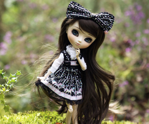 Cute Doll With Dark Hair And Black Bow wallpaper 480x400