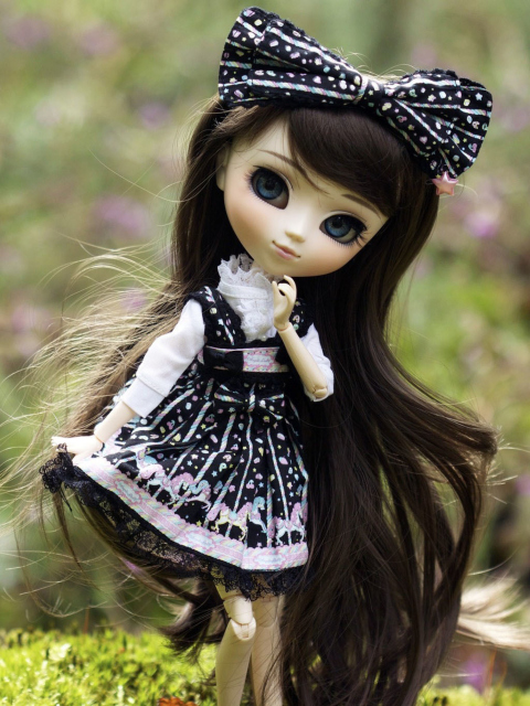 Cute Doll With Dark Hair And Black Bow wallpaper 480x640