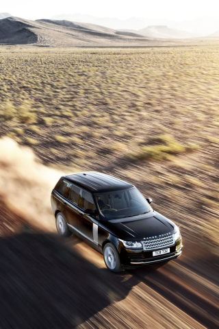 Sfondi Land Rover In Desert 320x480