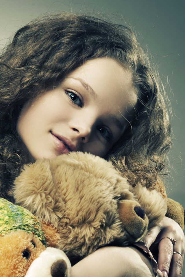 Little Girl With Toys wallpaper 640x960