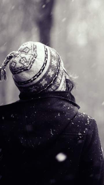 Girl Looking At Falling Snow wallpaper 360x640