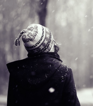 Girl Looking At Falling Snow Wallpaper for HTC Titan