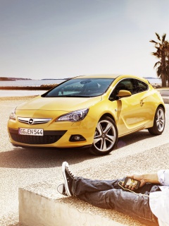 Couple with Opel wallpaper 240x320