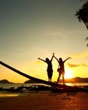 Fondo de pantalla Couple On Beach At Sunset 128x160