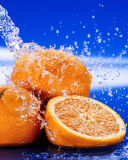 Обои Juicy Oranges In Water Drops 128x160