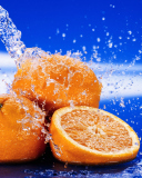 Juicy Oranges In Water Drops wallpaper 128x160