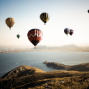 Air Balloons In Sky Above Ground wallpaper 128x128