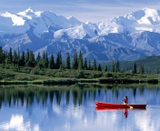 Canoe In Mountain Lake screenshot #1 176x144
