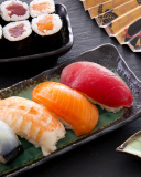 Das Sushi with salmon, tuna and shrimp Wallpaper 128x160