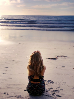 Lonely Girl On Beautiful Beach wallpaper 240x320