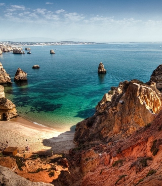 Kostenloses Beautiful Bay Behind Ocean Rocks Wallpaper für Motorola Quench XT3