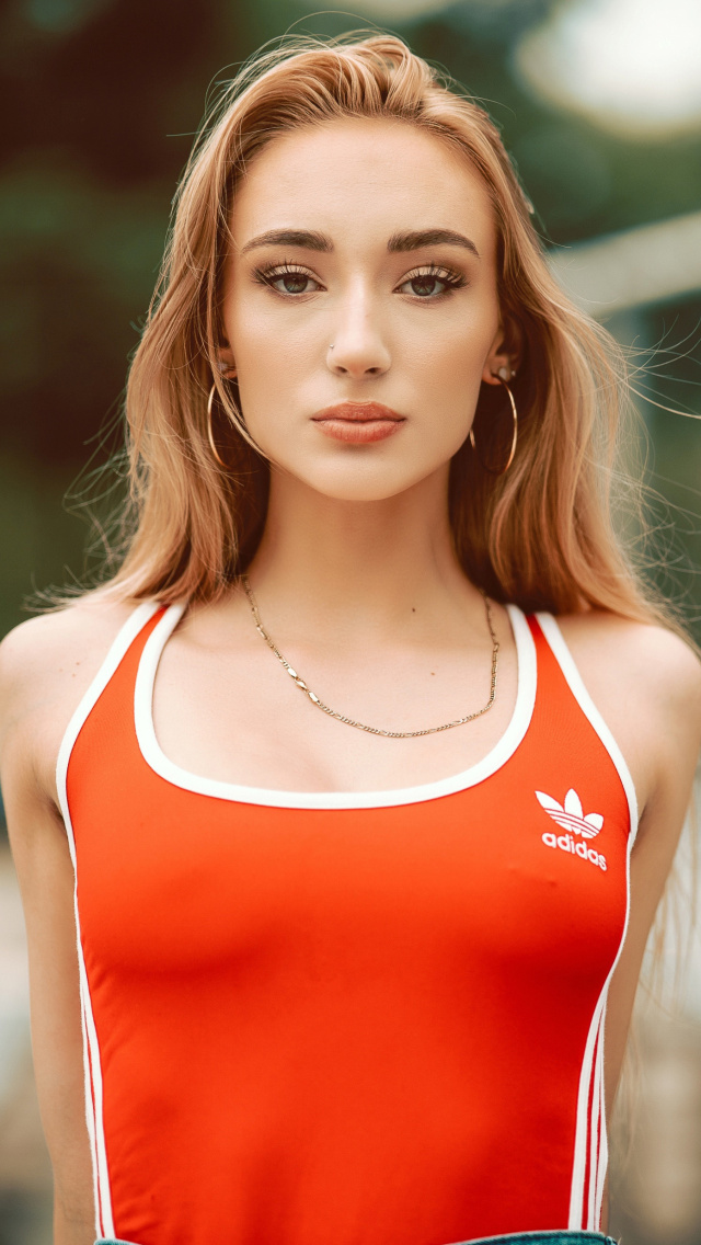 Blonde in Adidas Bodysuit wallpaper 640x1136