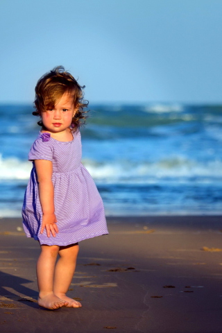 Little Girl On Beach wallpaper 320x480