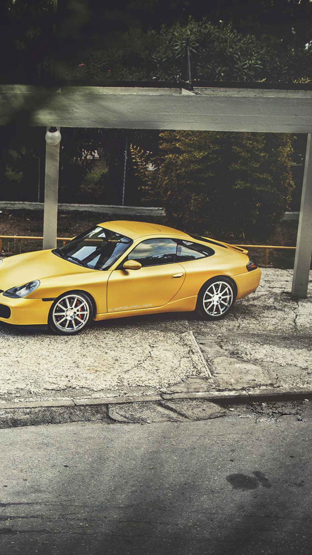 Yellow Porsche Carrera wallpaper 1080x1920