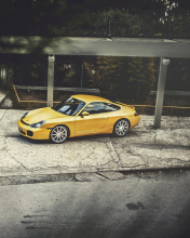 Yellow Porsche Carrera wallpaper 176x220