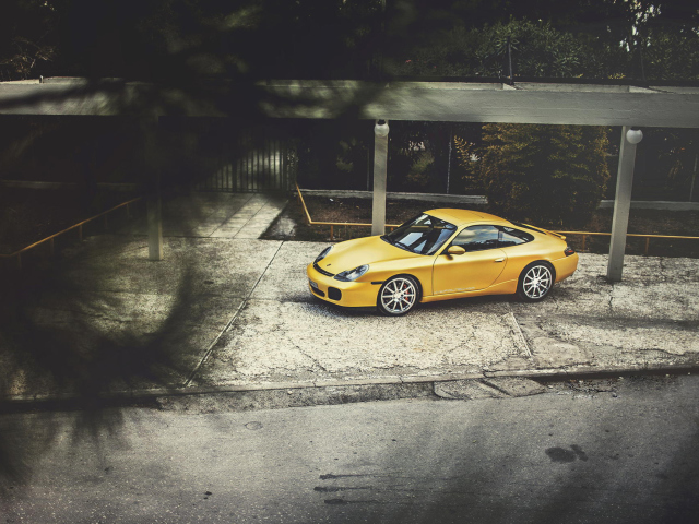 Yellow Porsche Carrera wallpaper 640x480