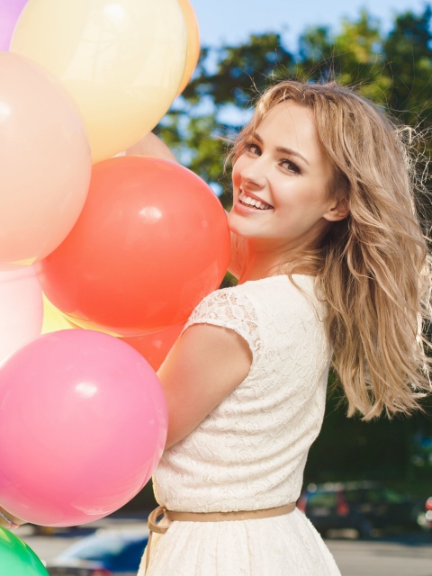 Smiling Girl With Balloons wallpaper 480x640